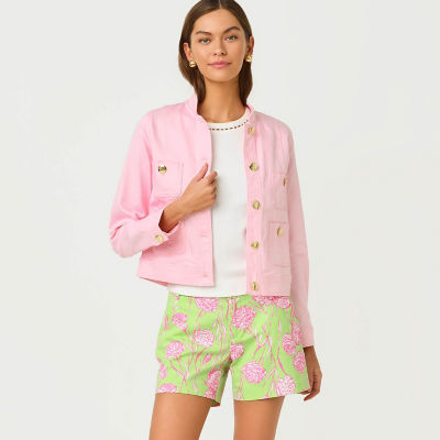 Woman wearing a pink jacket and pink and green printed shorts