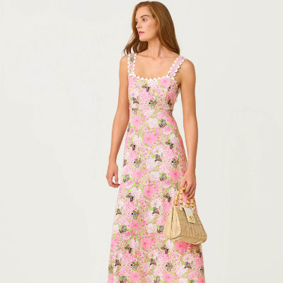 Women wearing a pink printed maxi dress