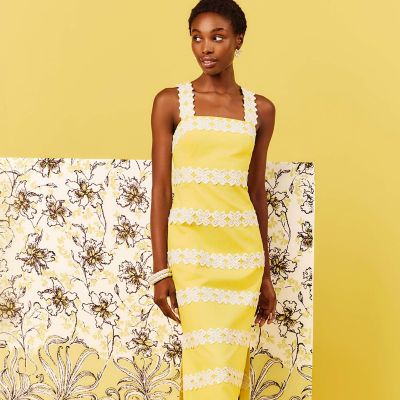 Woman wearing a yellow maxi dress