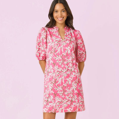 Women wearing a pink printed dress