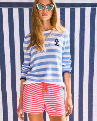 Woman wearing a blue striped sweater