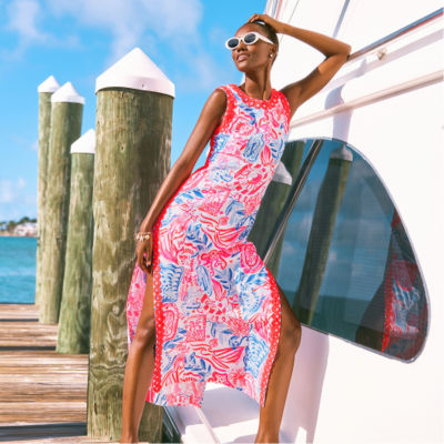 Woman wearing a red white and blue printed maxi shift romper