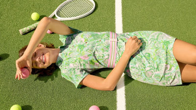 Woman wearing a green printed active dress