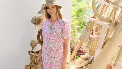 Woman wearing a pink printed dress