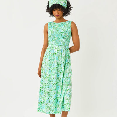 Women wearing a green and blue printed dress