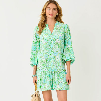 Women wearing a green printed dress