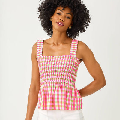 Woman wearing a pink and green gingham top