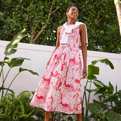 Woman wearing a red and white printed dress