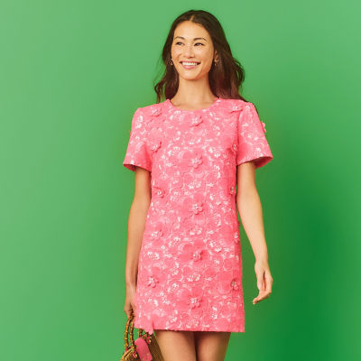 Woman wearing a pink short dress